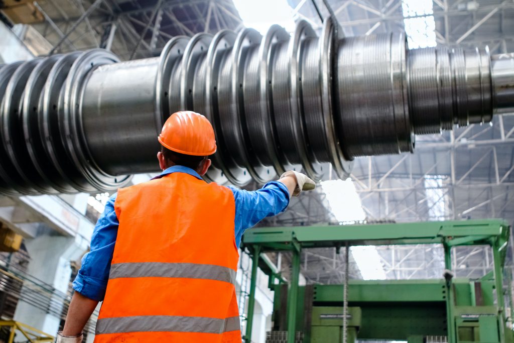 man-wearing-orange-hard-hat-2760241 Guidelines for Selecting ERP Systems for Consumer Products Manufacturers